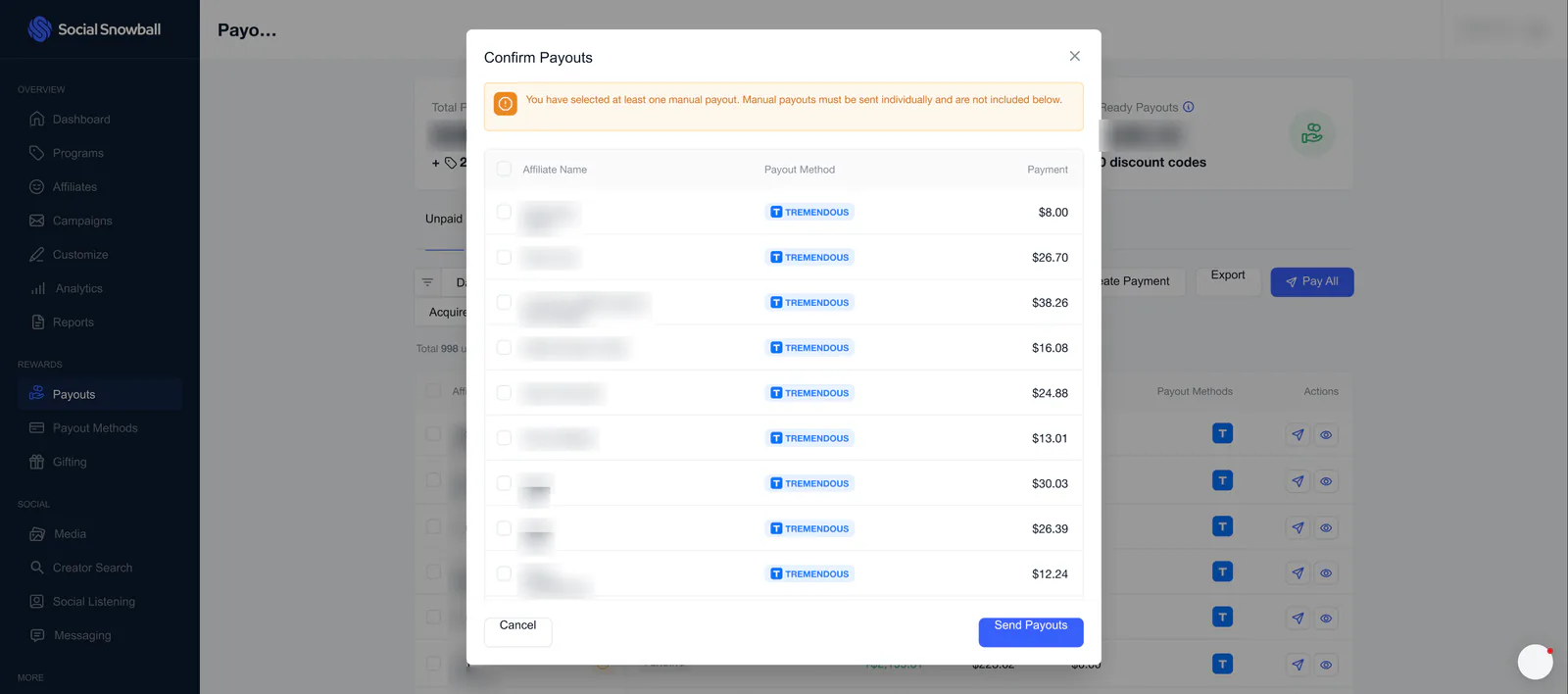 A Confirm Payouts dialog over the Unpaid table, with a warning about manual payouts, a list of affiliates with their Tremendous payout method and payment amount, and Cancel and Send Payouts buttons.